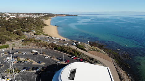 drone flight reveals the skyline and coastline of sandringham in melbourne