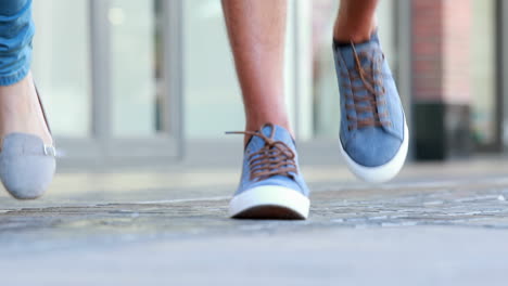 Couple-walking-through-the-mall