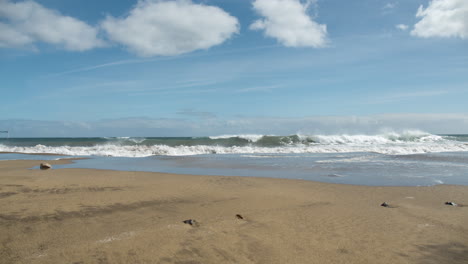 Sea-waves-roll-on-the-wet-sandy-shore