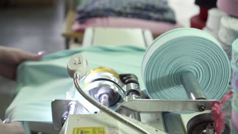 production and winding of fabric tape at a weaving factory