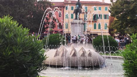 park with fountain in the center of bra square in verona, italy 2