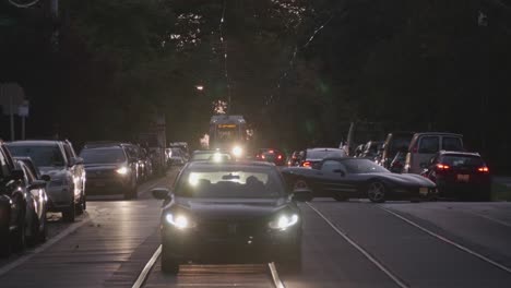 traffic, cars, headlights along chester avenue, west philadelphia, twilight