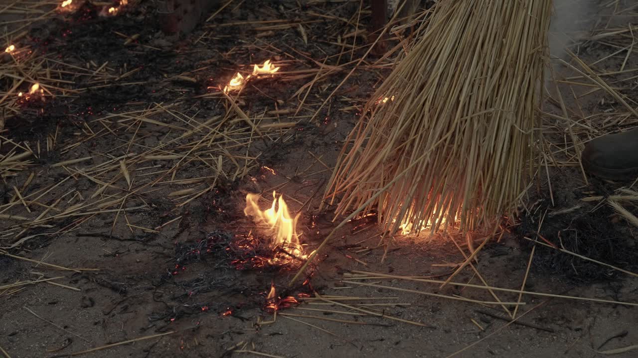 Straw ignites small ground fires during traditional slaughter in Minho Portugal