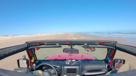 pov while driving on the beach, roof top removed from off road vehicle - south padre island, texas