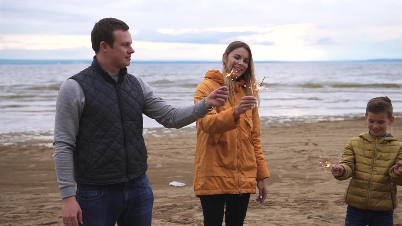 Family Fun on the Beach with Sparkler