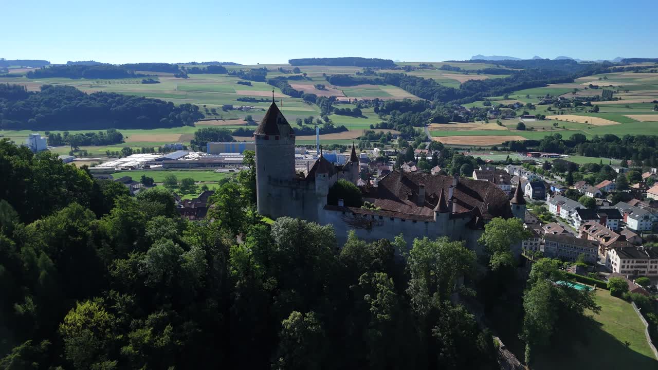 Lucens medieval castle Switzerland charming village Europe establish shot drone aerial