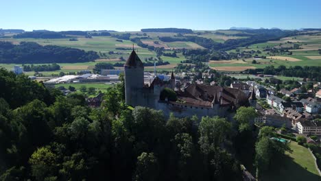lucens medieval castle switzerland charming village europe establish shot drone aerial