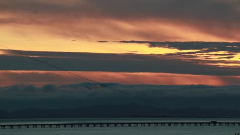 Dusk-along-the-straight-low-section-of-Astoria-Megler-bridge-truck-driving-Washington-to-Oregon