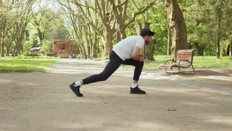 man stretching in park