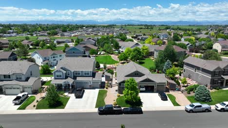 upscale neighborhood with colorado rocky mountains in distance