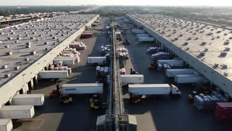 aerial view of a busy distribution center with trucks and warehouses: efficient logistics operations in action