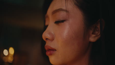 profile of a woman crying