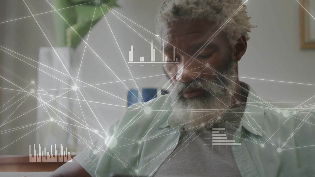 Senior man sitting in living room, using device, animated nodes registering tech activity after tap
