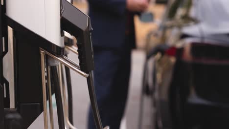 Close-up-of-charging-electric-car