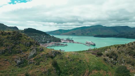 cass bay new zealand drone reveal through mountian tops