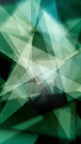 abstract background consisting of green glow triangles. loop vertical video.