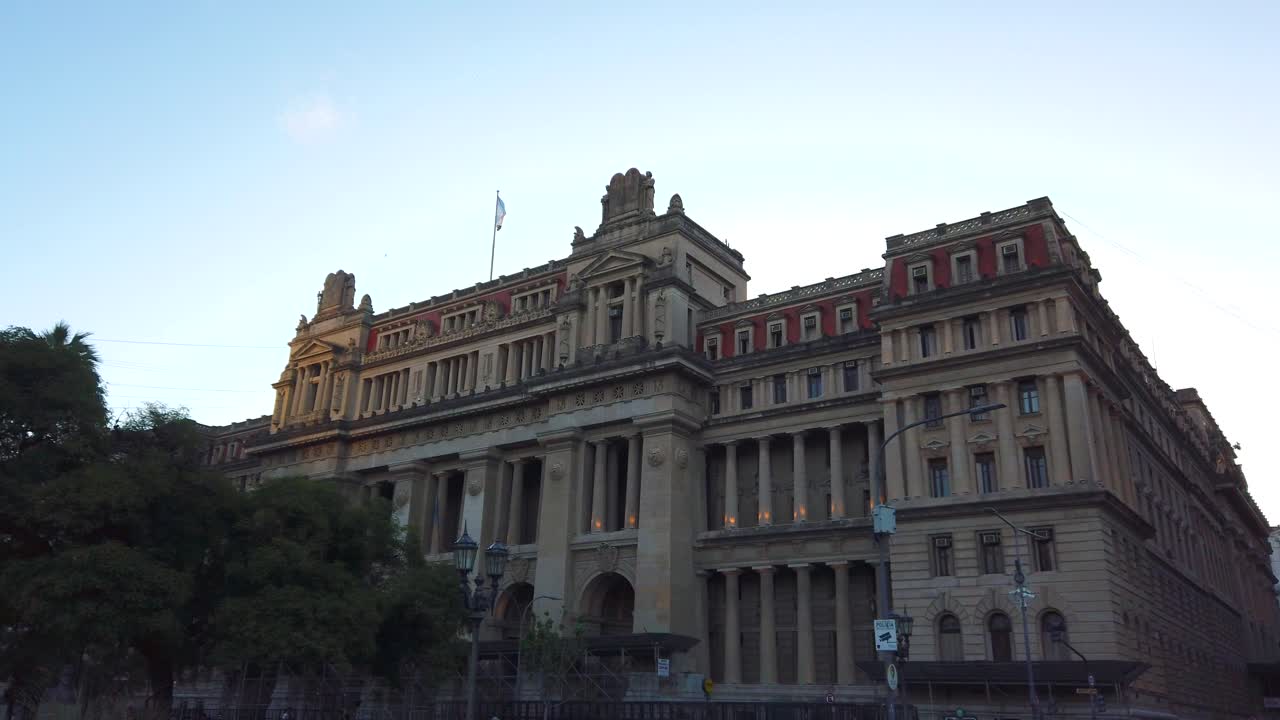 Palace of Justice in Buenos Aires, Argentina, historic judicial landmark with neoclassical design, backlit establishing angled view