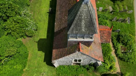 a slow downward pedestal shot, slowly tilting upwards to show st mary's church's tower