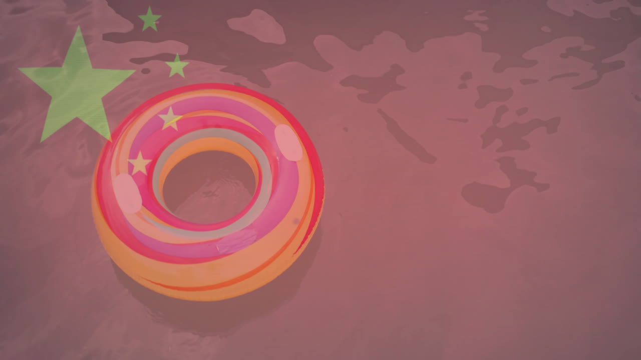 그 위에 초록색 별 애니메이션으로 물에 떠다니는 다채로운 부풀이 고리