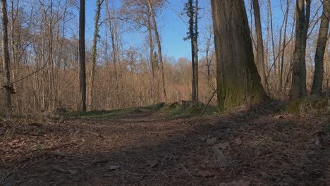 First-person-view-along-Invorio-trail-of-elves-in-Piedmont,-Italy