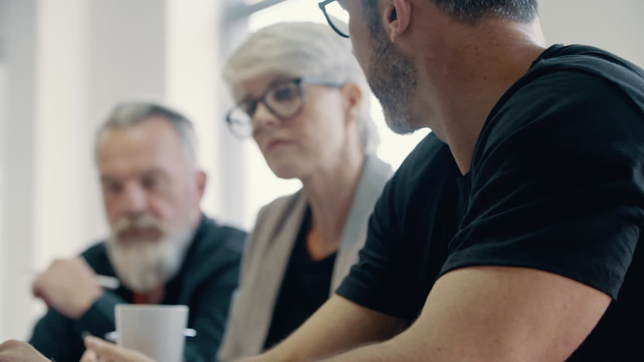 Business colleagues planning work in a meeting