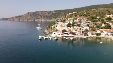 Stunning-architecture,-houses-built-on-the-mountain-in-Asos,-Greece,-aerial