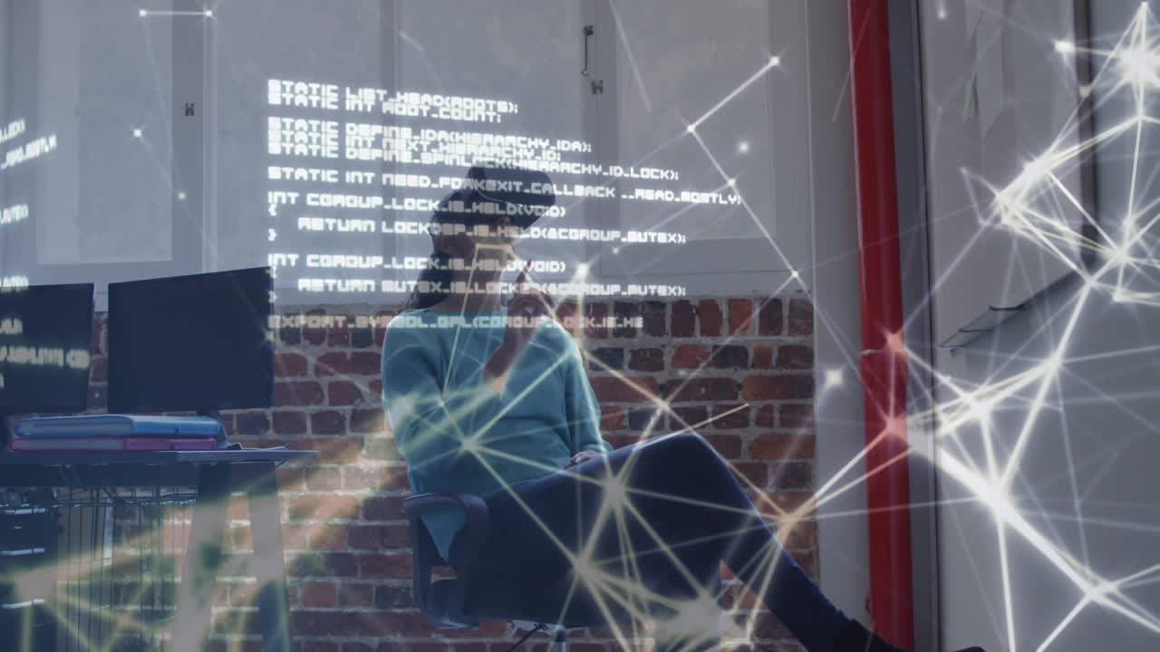 Digital composite video of network of connections against indian woman using vr headset at office
