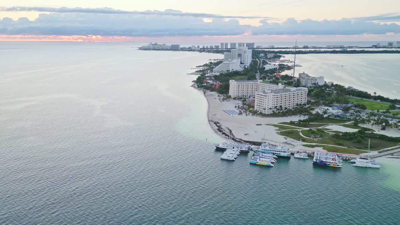 Cancún Hotel Zone aerial view, Langosta Beach, turquoise waters, sunrise, vacation vibe
