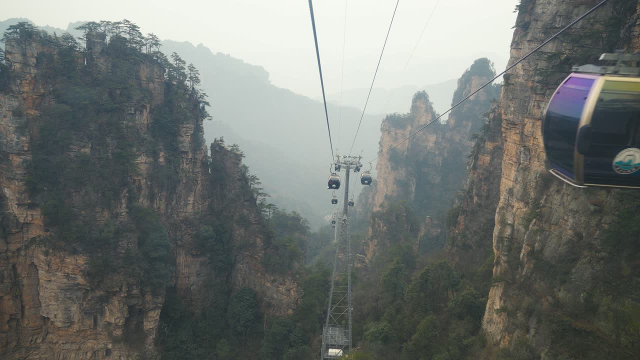 Cable Car Ride Through the Misty Mountains of Zhangjiajie, China