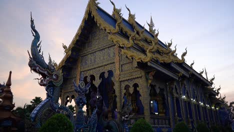 wat rong sear tean (blue temple) during sunset in chiang rai, thailand.