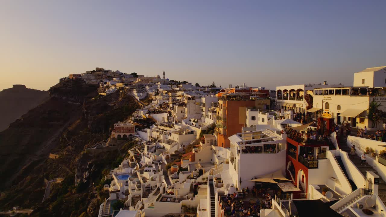 Panoramic View of the Cliffside Village of Fira, Santorini at Sunset