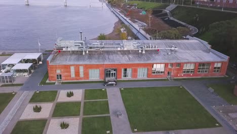 aerial view of industrial building by the river