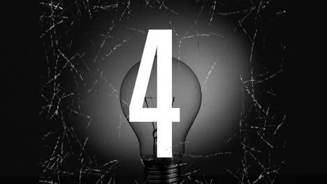 Number--animation-over-light-bulb-in-black-and-white