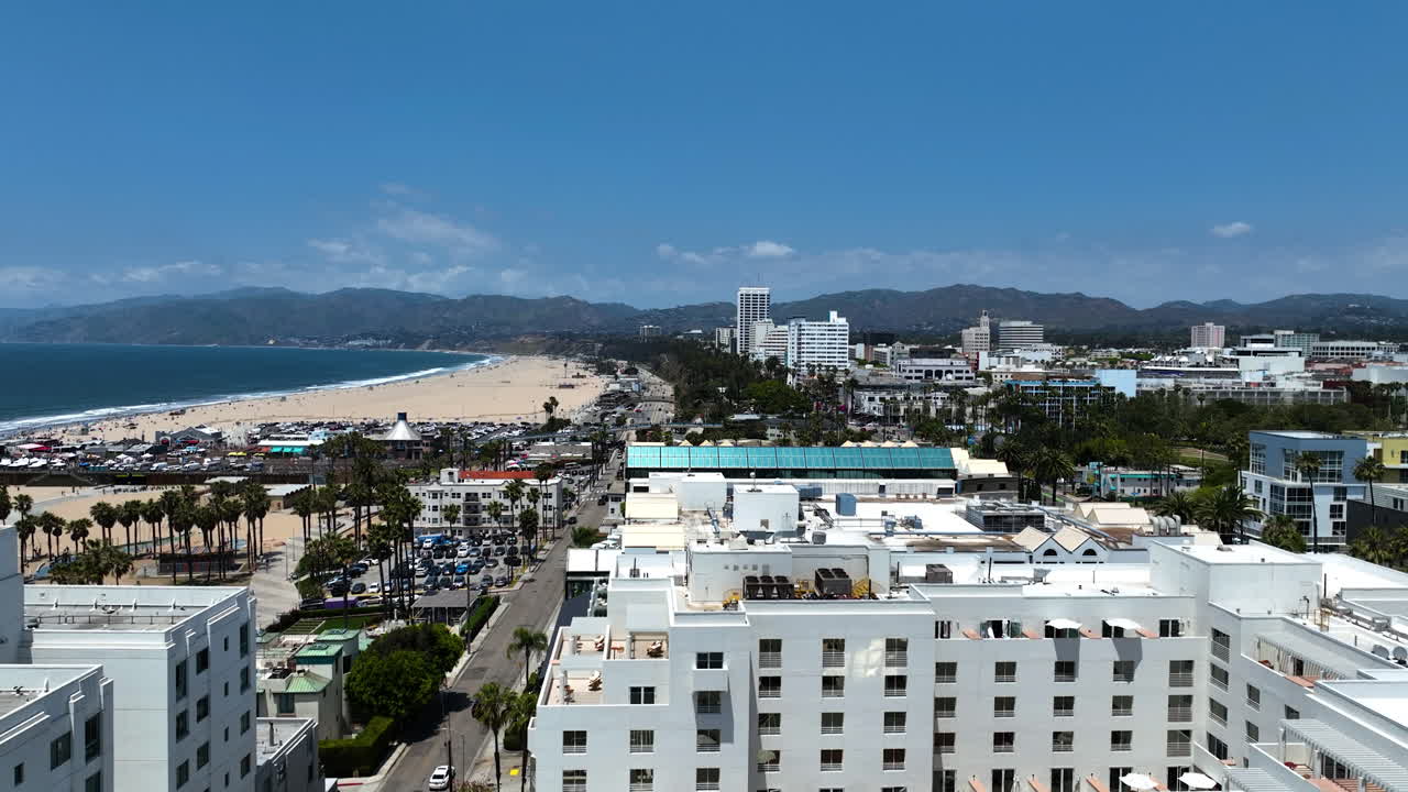 Aerial view flying over buildings and streets of Ocean Park, Santa Monica, LA