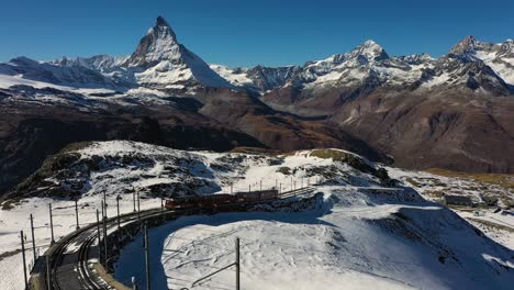 matterhorn mountain and gornergrat train in winter at sunset