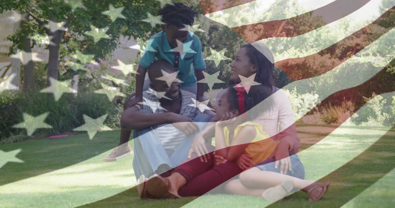 Father tickling daughter causing giggles and family bonding on grassy lawn for lifestyle marketing