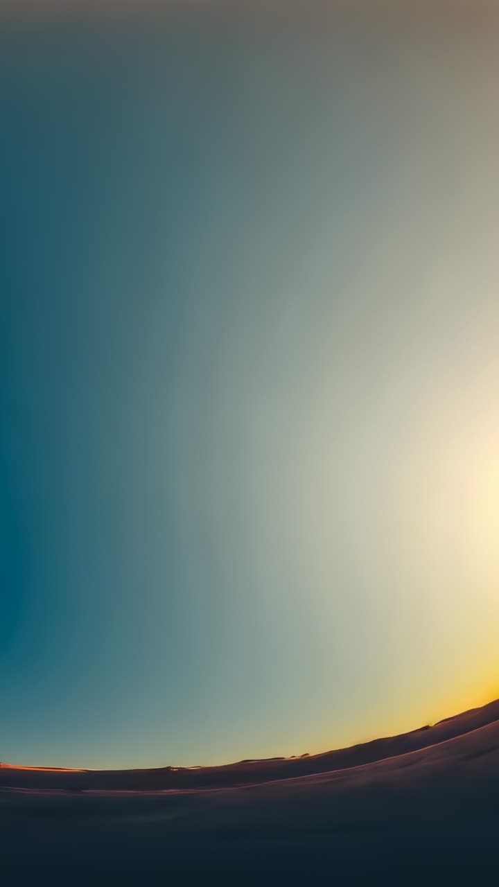 Vertical video: Revealing rising sun casting crepuscular rays above ...