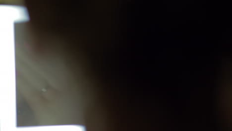 woman applying night facial cream