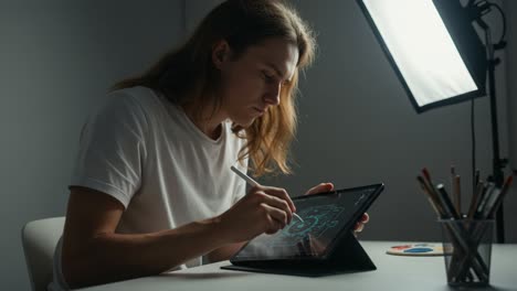 focused artist creating digital illustrations on a tablet in a well-lit space, engaged in creative process with intense concentration and precision