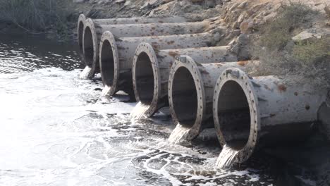 row of large industrial discharge pipes in karachi