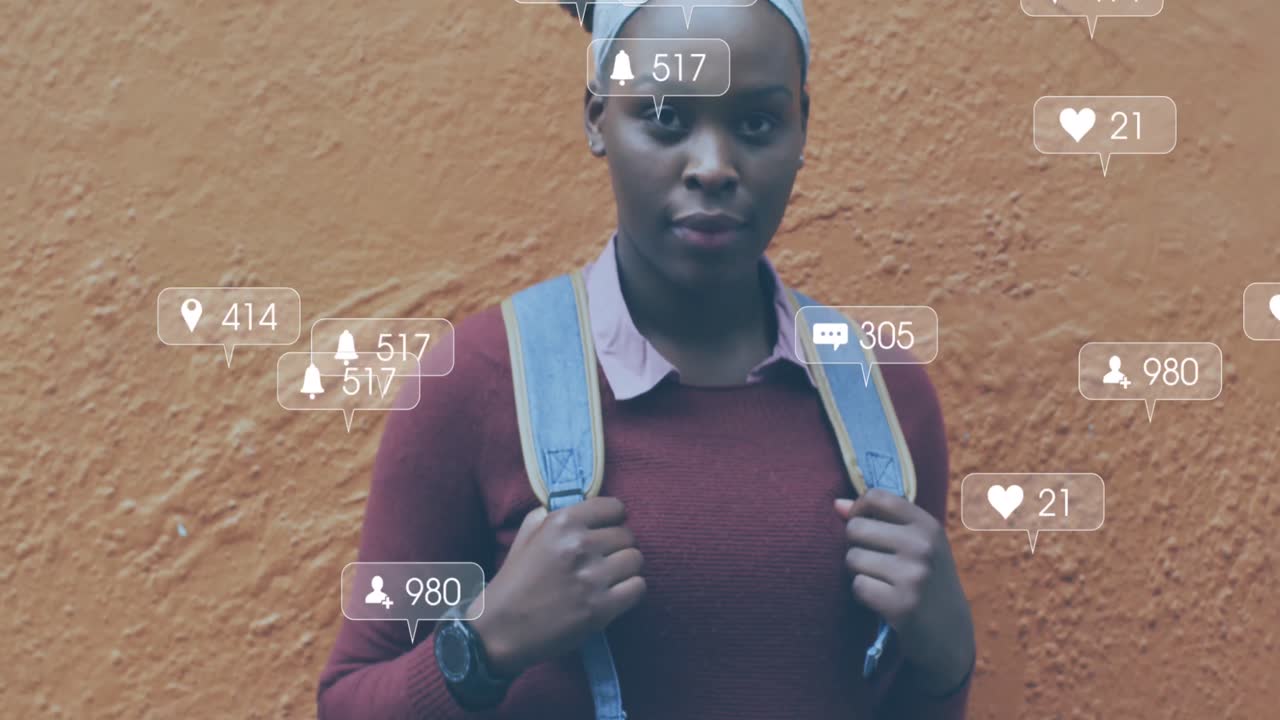 Animation of social media notifications over laughing african american woman in city street