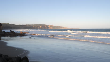 wide angle anglesea beach australia, rocky shear cliffs slow motion