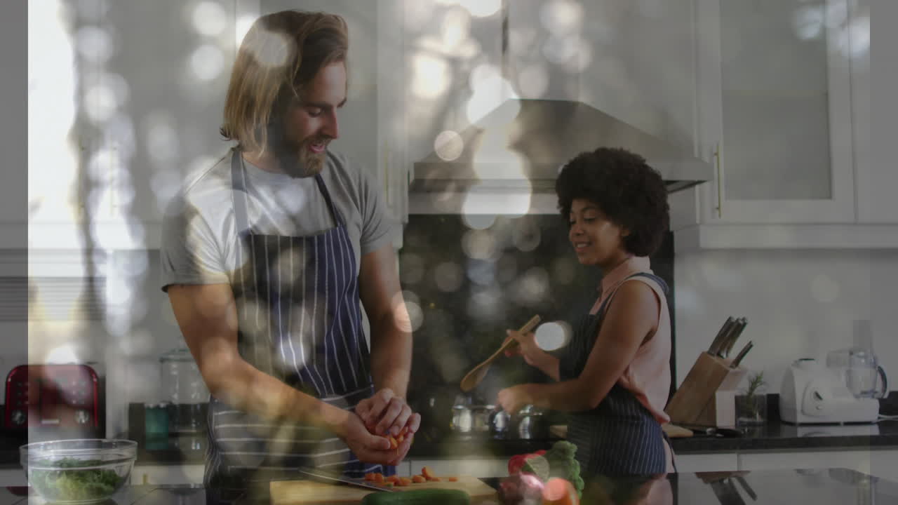 Cooking together in kitchen, couple using animation with bokeh light effect