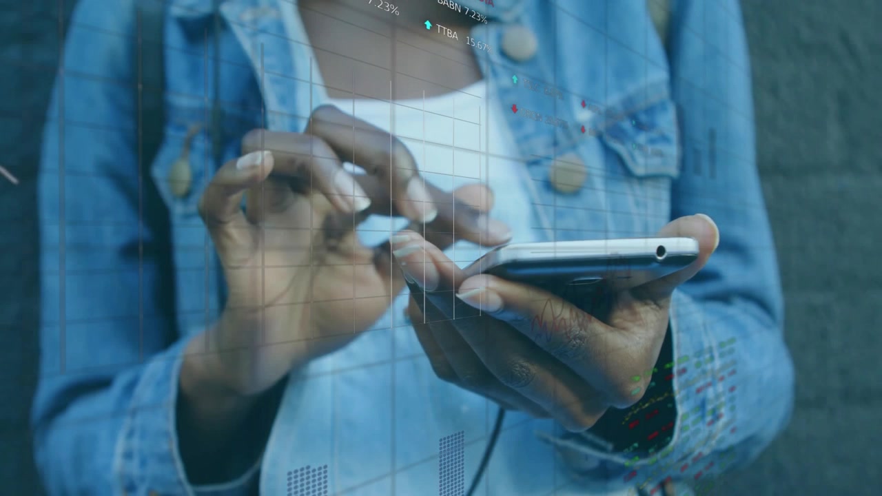 Woman tapping smartphone screen, scrolling to reveal grid, finance tickers and charts for analysis