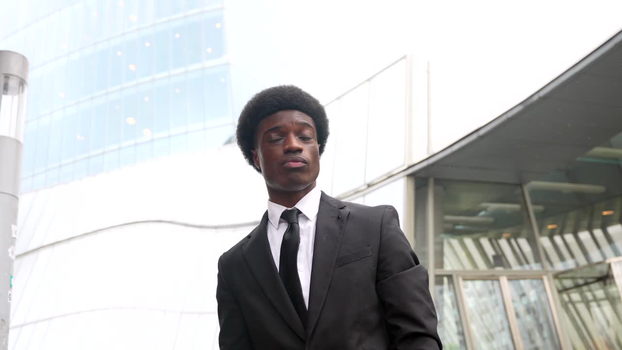 Businessman Using Phone in Urban Setting