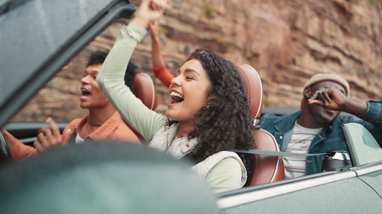Friends on a road trip in a convertible