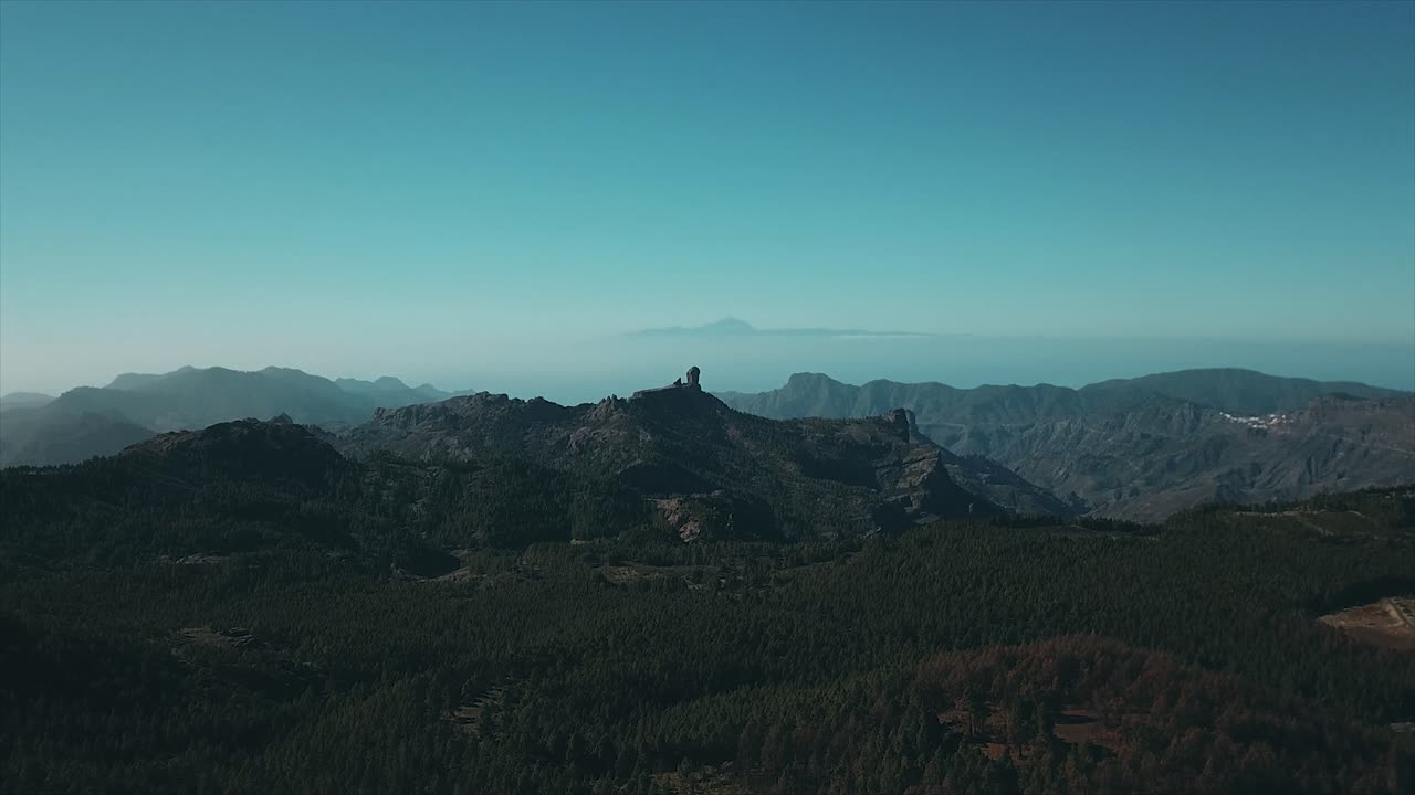 Flying through Gran Canaria with the highest point of Tenerife in the far distance