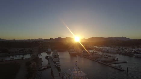 aerial shot of a eagle in the marina of san jose del cabo at sunset, baja california sur