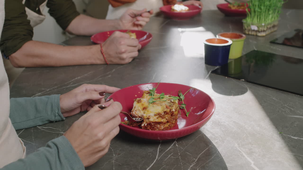 Eating Lasagna In Cooking Class