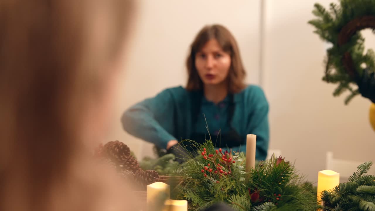 People Making Christmas Wreaths